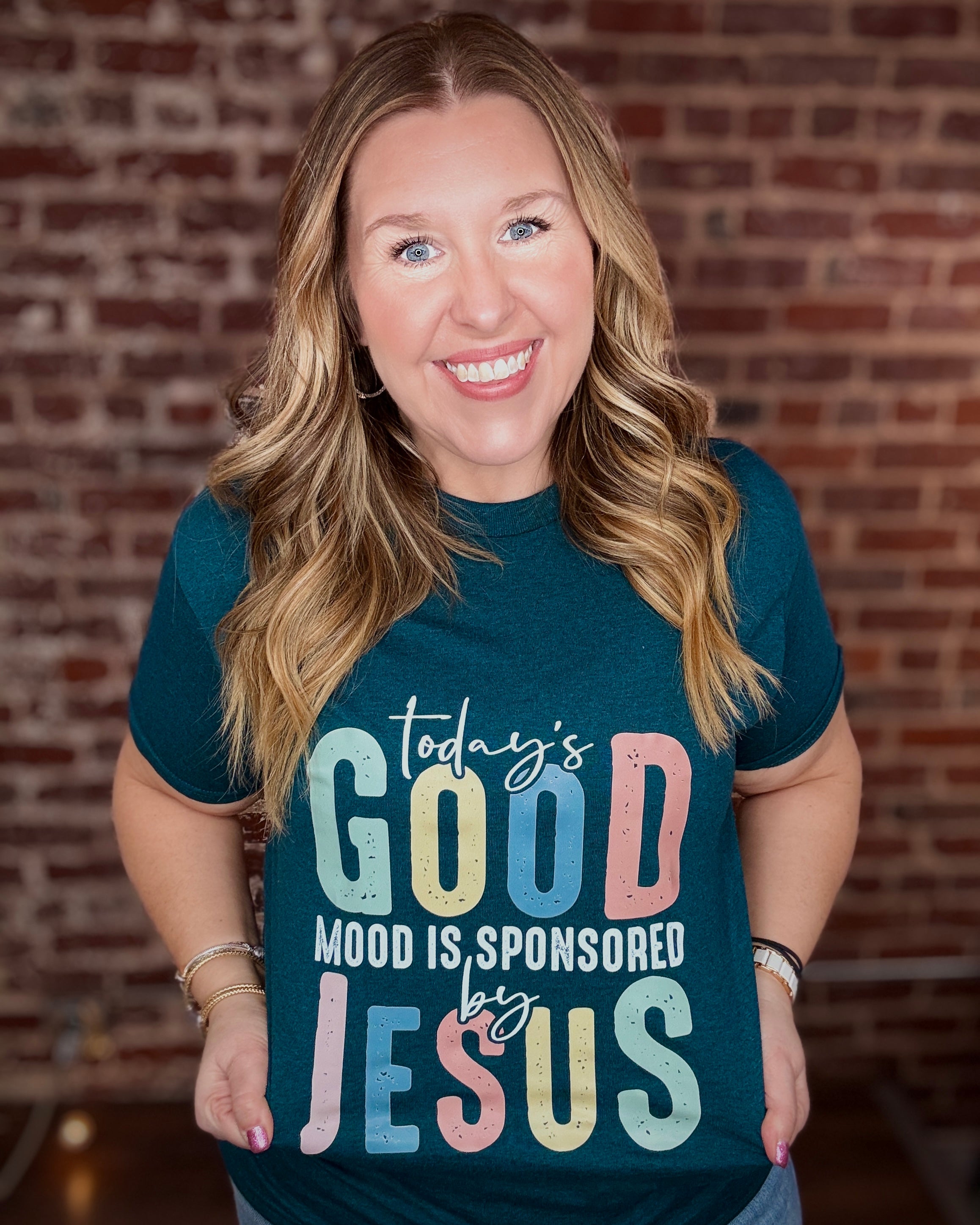 good-mood-tee-teal-heather-tee-with-sponsored-by-jesus-quote-pink